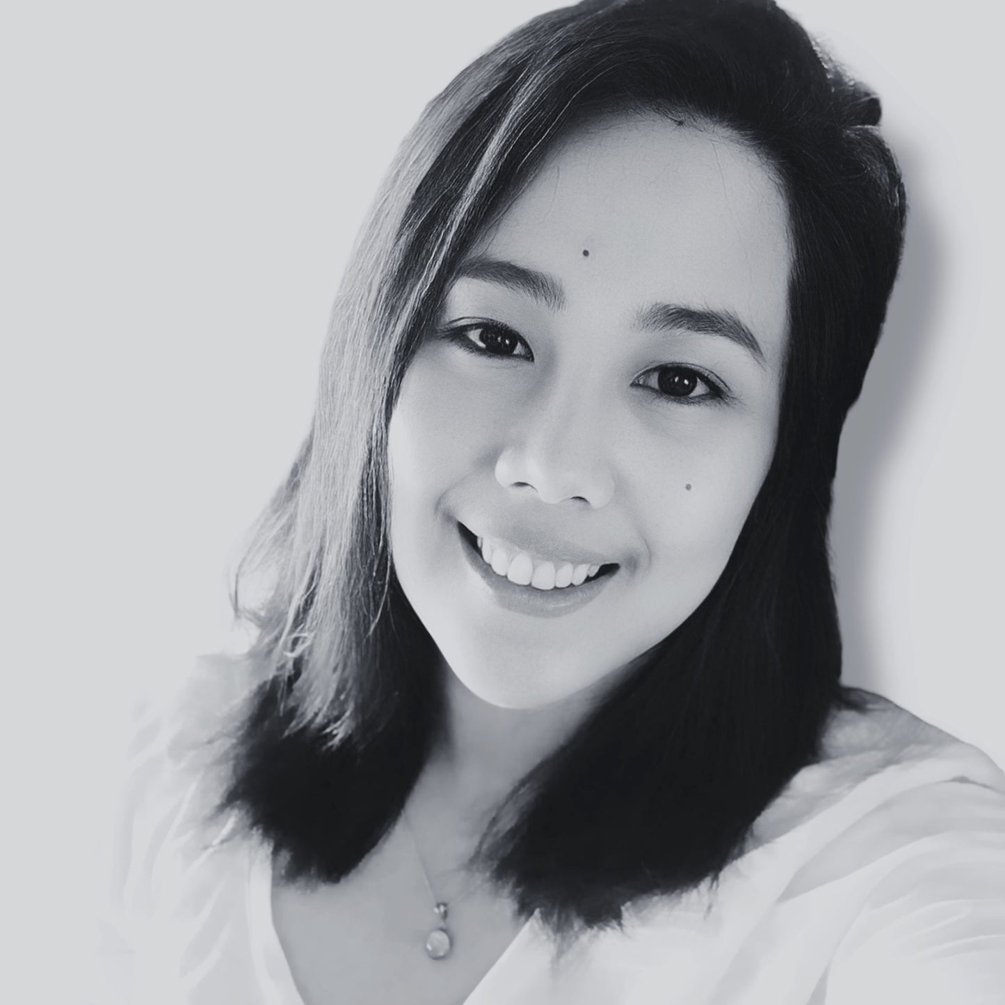 Professional portrait of Casey Huang, co-founder of Cazh, featured on the company's Leadership Team page